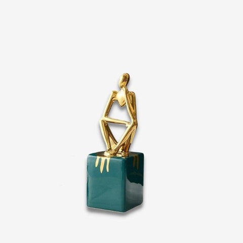 Statuette assise