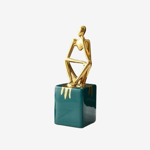 Statuette assise