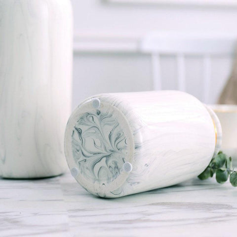 Vase blanc doré