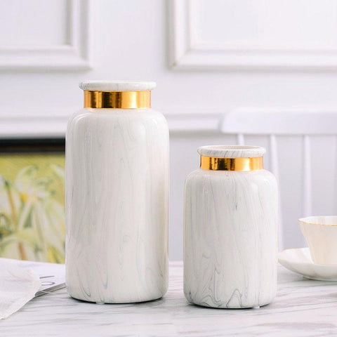 Vase blanc doré