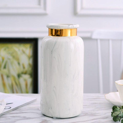 Vase blanc doré